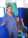 Butaw Clinic - woman attending the event on distribution of nets to the local villagers