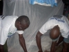 Volunteers showing how to use the net to the home owner