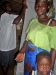 Mother and child in front of assembled mosquito net