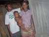 Mother and child in front of assembled mosquito net