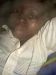 Child under the mosquito net