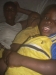Family laying under the mosquito net