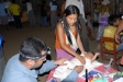 Dr. Anoop examines a baby in Napuruka