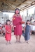 Receiving new bednets is cause for dressing in your best in Belen.