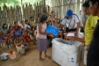 Families eagerly await the distribution of bednets in Belen
