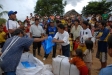 Familes eagerly await bednet distribution in Atahualapa. The families will put 2 or more children to bed beneath the nets this night, safer from mosquitoes, biting bats, and venomous snakes.