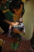 Examining a baby in Atahualpa, Peru