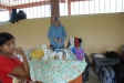 Cheryle works in the makeshift pharmacy set up in Nuevo Alegria. Getting medical care is hard to do, making prevention the key to stopping the outbreak of malaria.