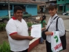 Patty being presented with an official thank you from the government in Manseriche