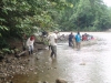 Workers take to the river for transportation in Peru.