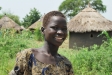 A warm welcome from one of the village girls.