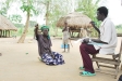 A village elder indicates an area for the parish training to take place.