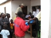 One of the first long lasting insecticide bednet recipients gladly accepts his net.