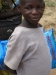 One happy little Zambian prepares to take his net home.