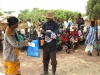 One young gentleman receiving his long lasting insecticide net.