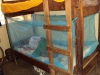 Mnyambe Sec. - A young girl smiles as she tests out her new donated net.