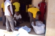 Mundemu School: One by one, the students collect a mosquito net.