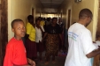 Mundemu School: The nets are taken into the dormitories.