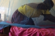 Mundemu School: The fabric is carefully tucked into the bed's frame.