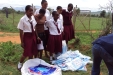 Mpwapwa Sec: The students wait patiently to take a net.
