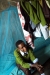 St. Christopher School: One young girl sits by her now protected bed.