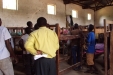 Mbabala School: The teachers and students are shown how the nets are to be attached to the building's existing structure.