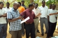 Mvumi School: The headmaster discusses the importance of the nets with the young men.