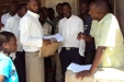 Hijira School: The students, the caregivers and the teachers work together to ensure that the distribution is a success.