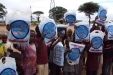 Bicha School: The youngsters proudly hold their life-saving nets above their heads.
