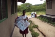 Abeid Amani School: ...and then carry them to the dormitories.