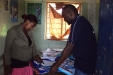 Chunyu Sec: The headmistress checks and documents the successful distribution with the lead caregiver.