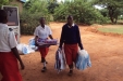 KONGWA-SEC At Kongwa-Sec and all girls high school the young women collect their nets from the distribution team.