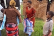 Intela: Organizers hand out nets to cover every sleeping space in the school, in conjunction with a national effort to do so.
