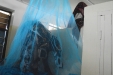 Intela: Students and staff hang LLINs (long lasting insecticidal nets) over each bed, being careful to install correctly. These nets will last up to 5 years before needing replacement if used properly.