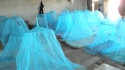 Wampambe - Once installed, the nets appear as a sea of protection in the dormitory.