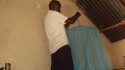 Ihanja: The nets are carefully secured to the dormitory's wooden structure.