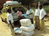 Chidya Sec. - A volunteer passes out LLINs to a group of students.
