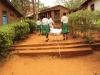 The girls are great helpers in carrying in the bundles of nets that are being hung in the dormitories in Ndwika.
