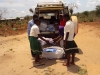 KISIWA SEC: The truck is slowly unloaded.