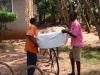 Everyone helps with the transportation of nets.