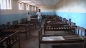 Mbekenyera Sec. School - Before nets were distributed, volunteers checked rooms to see how many sleeping spaces needed to be covered.