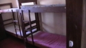 NGONGO SEC. SCHOOL: Rows of bunk beds in need of malaria protection.