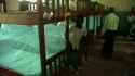 MTAMA SEC: Slowly the students work to ensure proper installation.