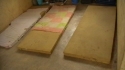 NANDANGA SEC. SCHOOL: Simple mats on the floor provide sleeping space for these students.