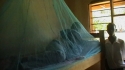 Ruo Sec. School - Since many sleeping spaces were not covered by nets previously, students were eager to test out their beds with the nets.