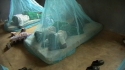 Barikiwa Sec : The children demonstrate the protection that the Long-Lasting Insecticidal Nets provide.