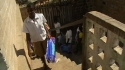 Kipatimu Sec : They go up to their dormitories to install the nets.
