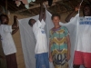 Volunteers assembling the mosquito net at a local home