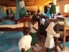 Masasi Girls - Students hang their nets in this dormitory space.