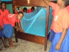 King David Sec. - Students work together to put up a new bed net.